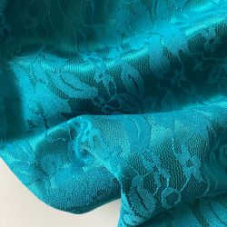 Гипюр на атласе бирюзовый