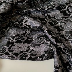 Гипюр на атласе черный с серебром 